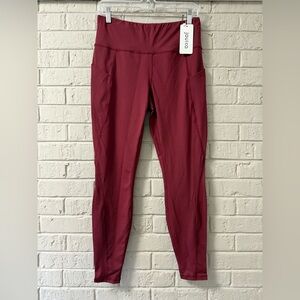 jouica Burgundy Leggings with side pockets. NWT. M